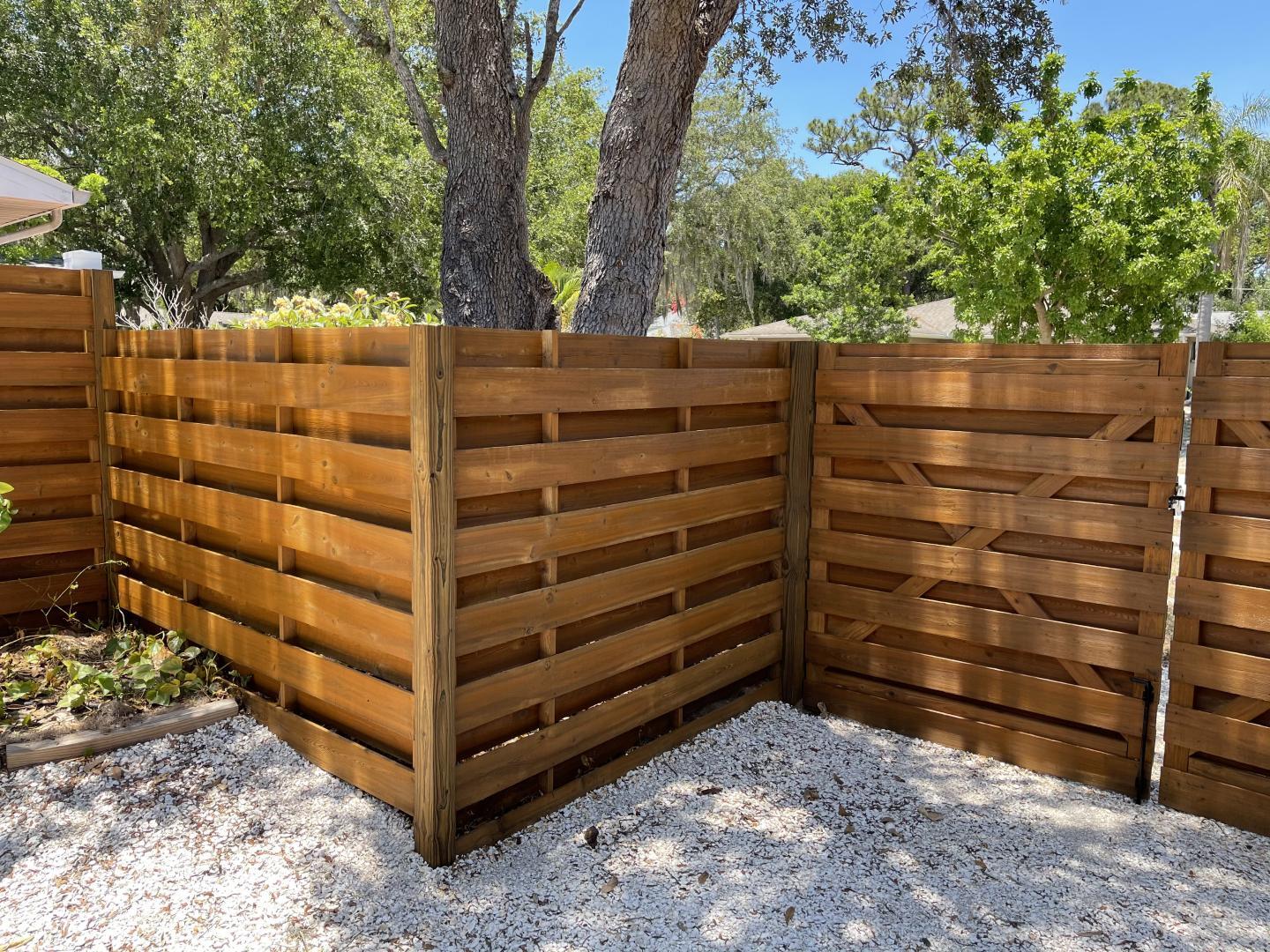 Is Your Fence Fading? Why Fence Cleaning and Staining Is Essential for Gulf Coast Florida Homeowners