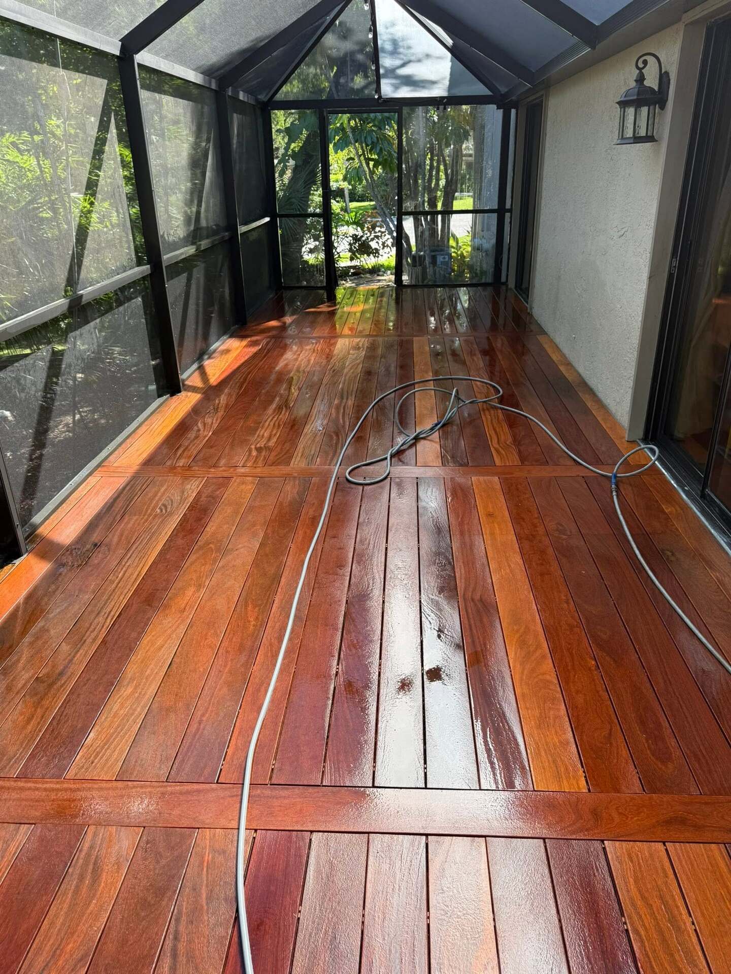 How Deck Staining Works in Florida's Hot Summer Months — and Why It Takes a Professional to Get It Right